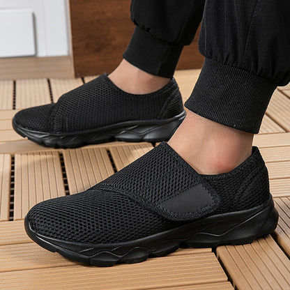 Verstellbare orthopädische Unisex-Sneaker mit Klettverschluss und Mesh-Design.