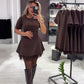 Ein stilvolles Kleid mit einem glitzernden Mesh-Patchwork-Muster.