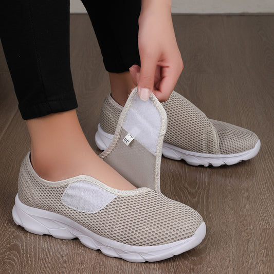 Verstellbare orthopädische Unisex-Sneaker mit Klettverschluss und Mesh-Design.