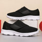 Verstellbare orthopädische Unisex-Sneaker mit Klettverschluss und Mesh-Design.