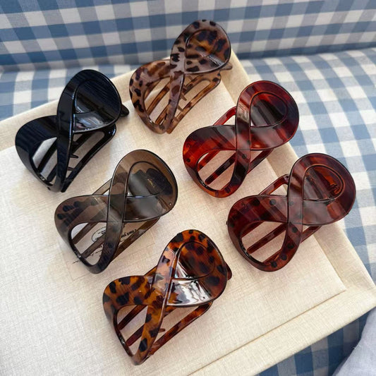 2026 Neue kreative Haarspange in Form einer Acht